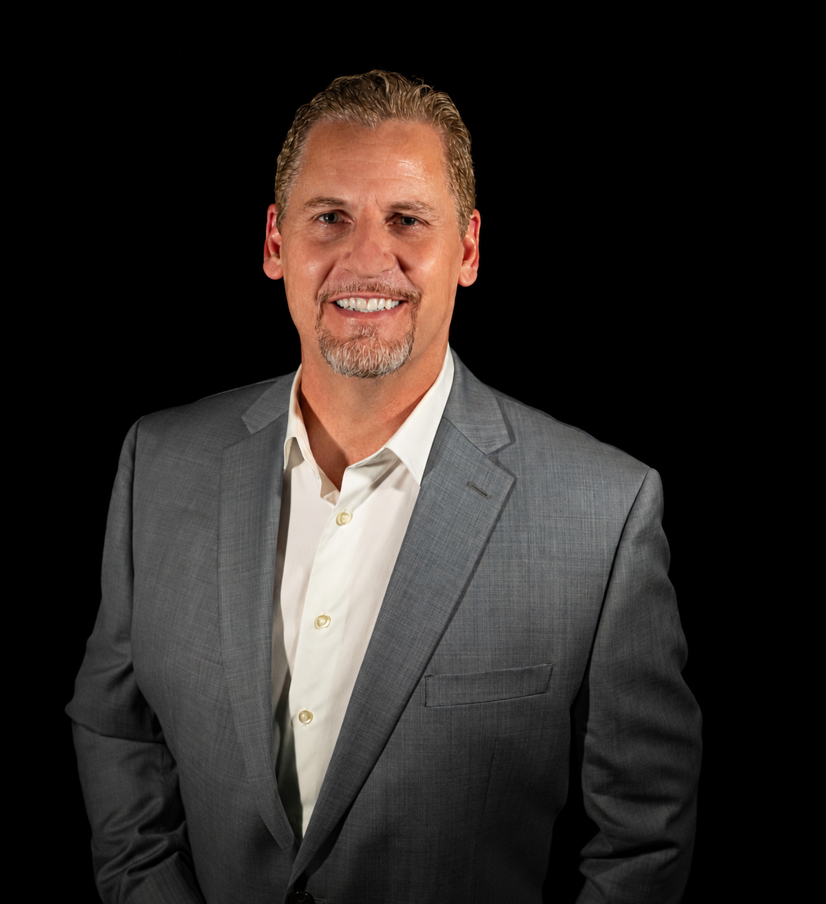 David Webb — professional portrait, gray suit